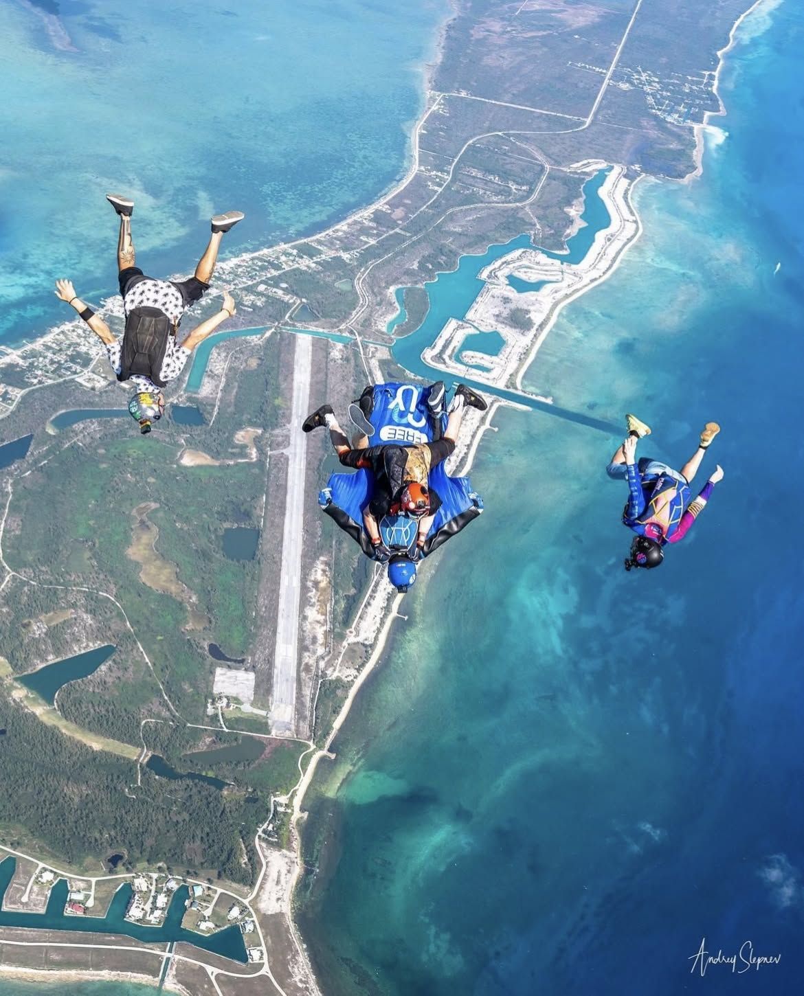 Skydivers in freefall over West End, Grand Bahama