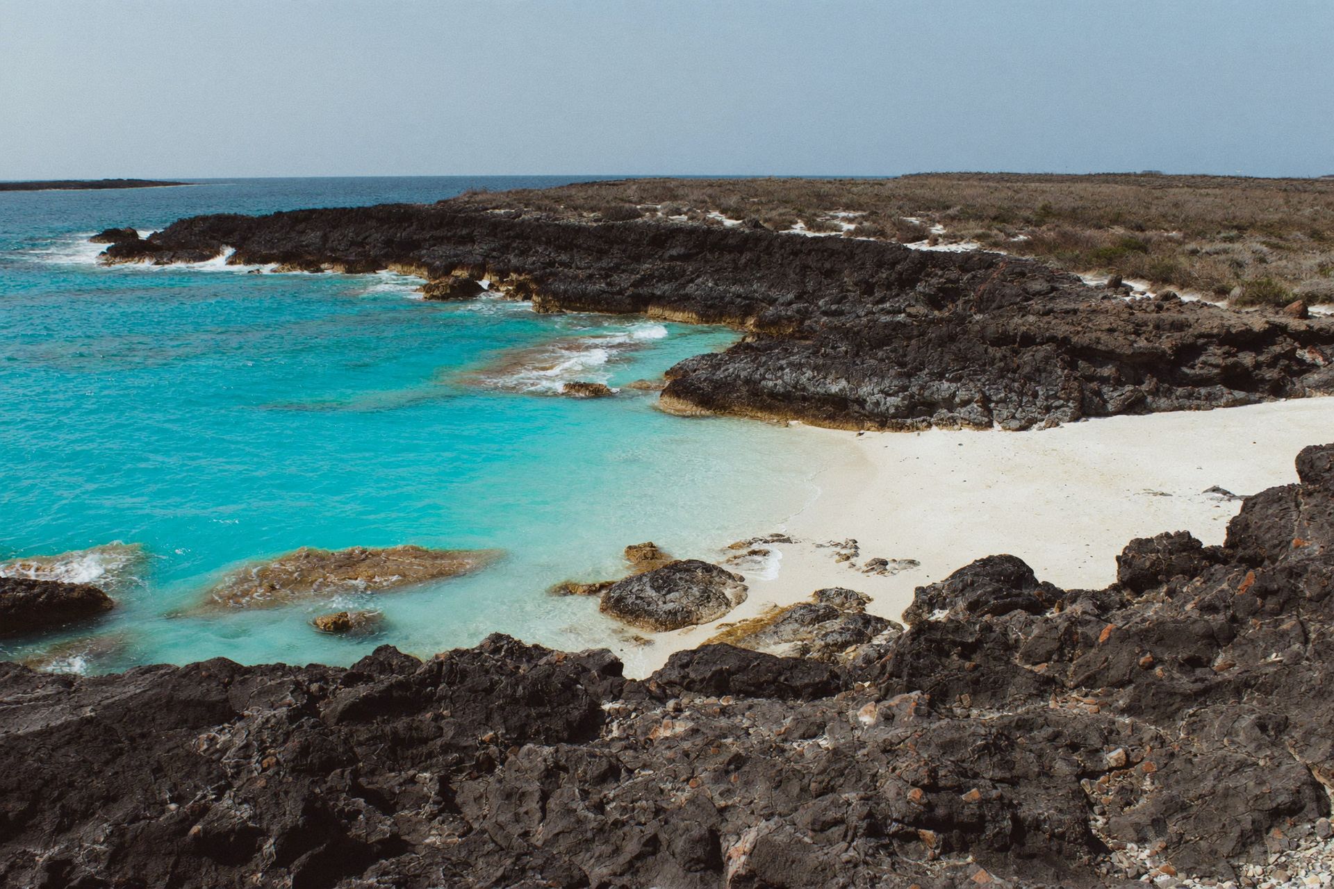 Ironshore rocks and a hidden cove on Acklins